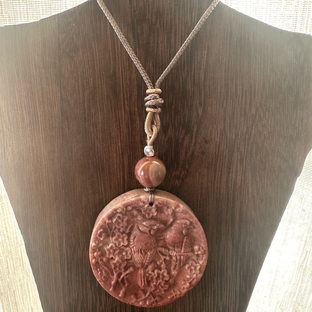 Coral Fossil Carved Round Bird Pendant Necklace on Tan Adjustable Rope - Picture 5 of 13